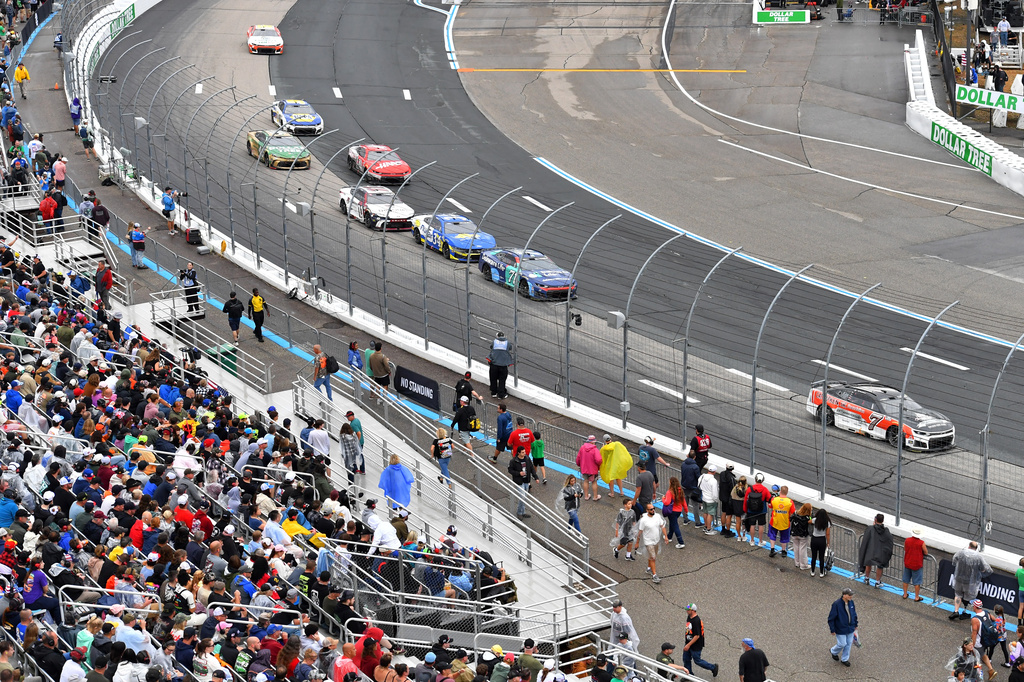 Daniel Suarez (7) makes his way through Turn 1 during a NASCAR Cup Series auto race, Sunday, Aug. 23, 2026, at New Hampshire Motor Speedway in Loudon, N.H. (AP Photo/Steven Senne)