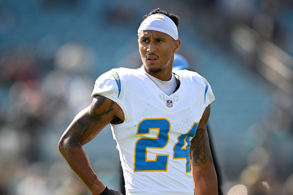 FILE - Los Angeles Chargers cornerback Benjamin St-Juste warms up before an NFL football game against the Jacksonville Jaguars, Nov. 16, 2025, in Jacksonville, Fla. (AP Photo/Phelan M. Ebenhack, File)