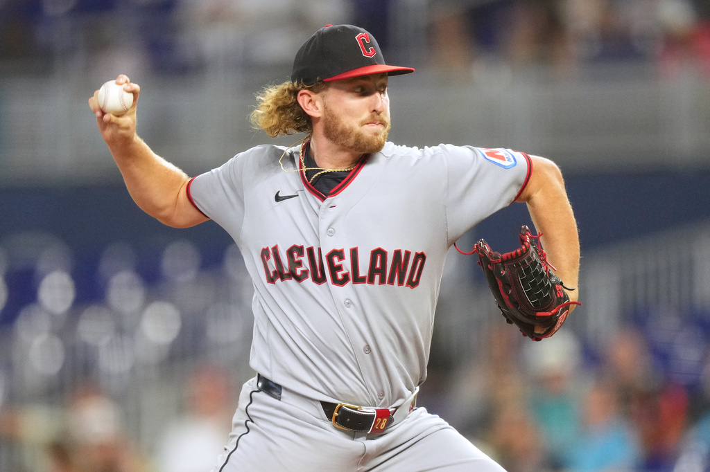 Cleveland Guardians starting pitcher Tanner Bibee throws during the first inning of a baseball game against the Miami Marlins, Saturday, July 11, 2026, in Miami. (AP Photo/Jim Rassol)