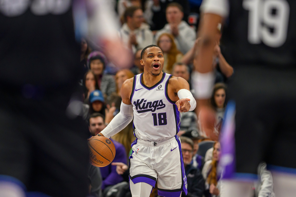 Sacramento Kings guard Russell Westbrook brings the ball up court during the first half of an NBA Cup basketball game against the Utah Jazz, Friday, Nov. 28, 2025, in Salt Lake City. (AP Photo/Tyler Tate)