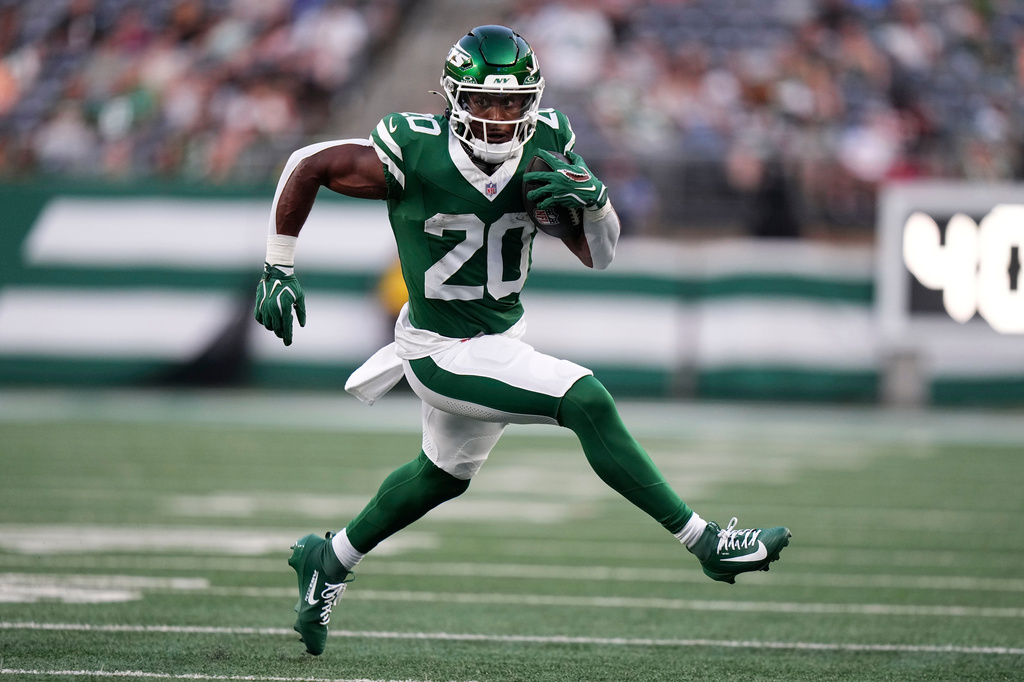 New York Jets running back Breece Hall runs up field during the first half of a preseason NFL football game against the Tampa Bay Buccaneers, Friday, Aug. 14, 2026, in East Rutherford, N.J. (AP Photo/Frank Franklin II)