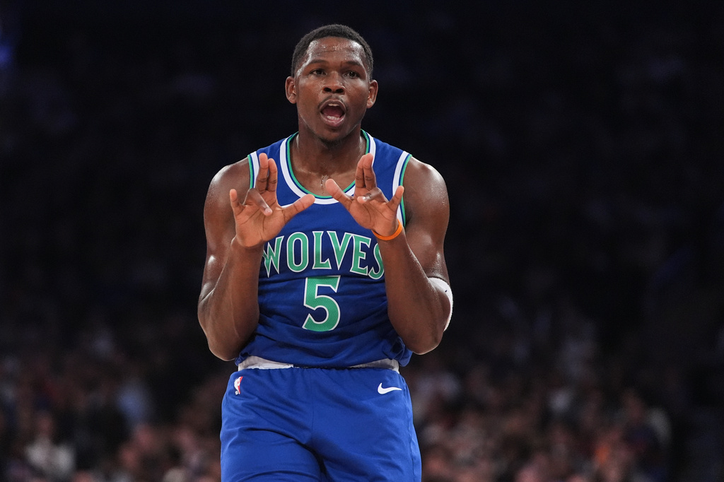 Minnesota Timberwolves' Anthony Edwards (5) gestures after making a three-point shot during the first half of a preseason NBA basketball game against the New York Knicks Monday, Oct. 12, 2026, in New York. (AP Photo/Frank Franklin II)