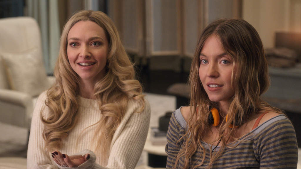 This image released by Lionsgate shows Amanda Seyfried, left, and Sydney Sweeney in a scene from "The Housemaid." (Lionsgate via AP)