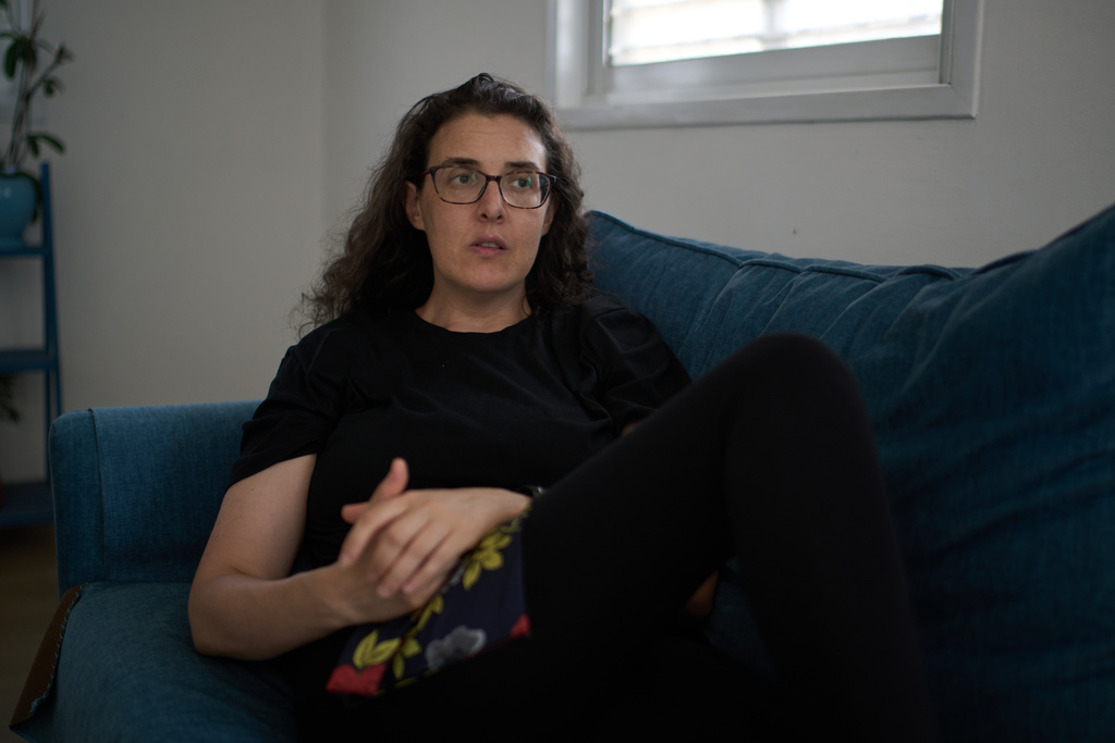 Israeli-Russian doctoral researcher from Princeton University, Elizabeth Tsurkov, who was kidnapped in Iraq, in 2023 and released last September, poses for a photo during an interview in Ramat Gan, Israel, on Nov. 6, 2025. (AP Photo/Leo Correa)