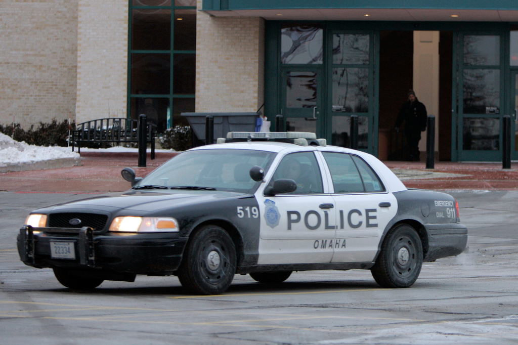 FILE - An Omaha police car drives on Dec. 8, 2007, in Omaha, Neb. (AP Photo/Jeff Roberson, File)
