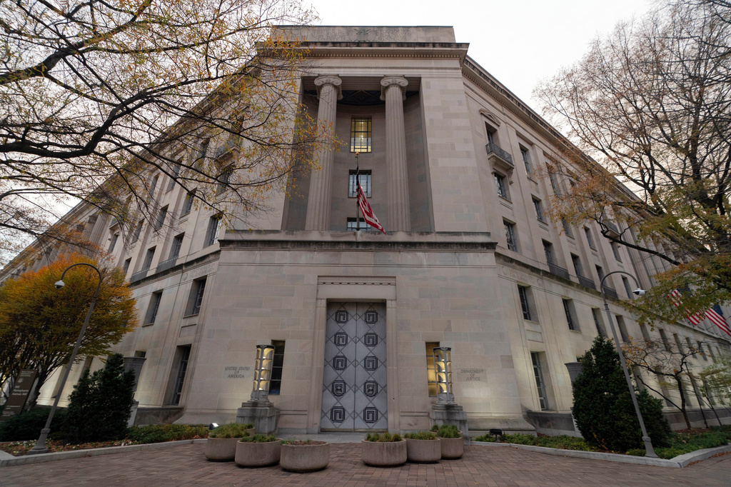 FILE - The U.S. Department of Justice building is seen in Washington, Saturday, Dec. 7, 2024. (AP Photo/Jose Luis Magana, File)
