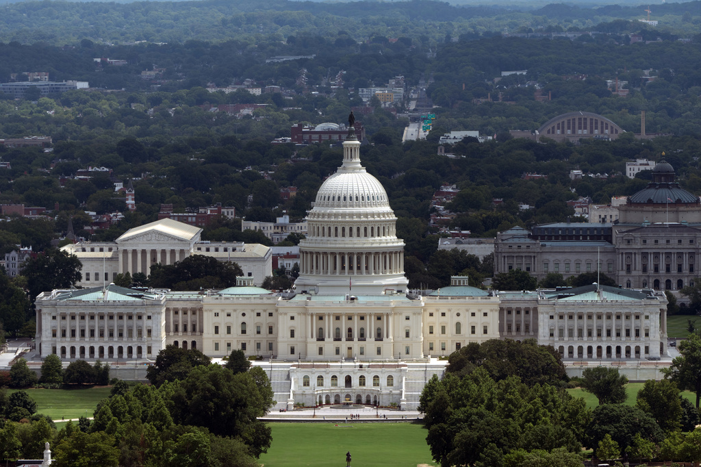 The Capitol is seen from the Washington Monument, Friday, July 31, 2026, in Washington. (AP Photo/Mark Schiefelbein)