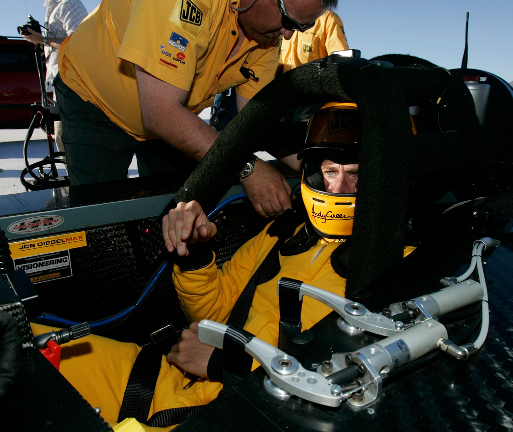 FILE - British driver Andy Green gets strapped into his seat before setting a new unofficial world diesel powered land speed record of over 328 mph over two runs Tuesday, Aug. 22, 2006, on the Bonneville Salt Flats of Utah. (AP Photo/Douglas C. Pizac,File)