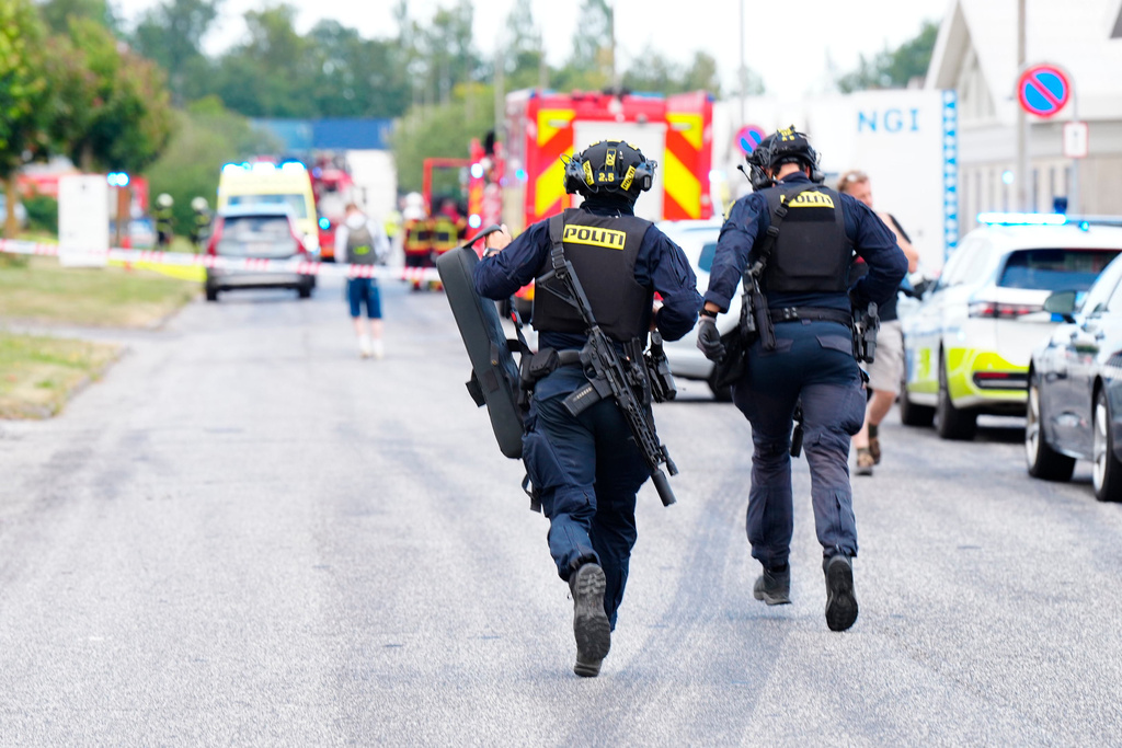 Police respond near the scene of a shooting in Nørresundby, in the North Jutland region in northern Denmark, Friday, July 17, 2026. (Henning Bagger/Ritzau Scanpix via AP)