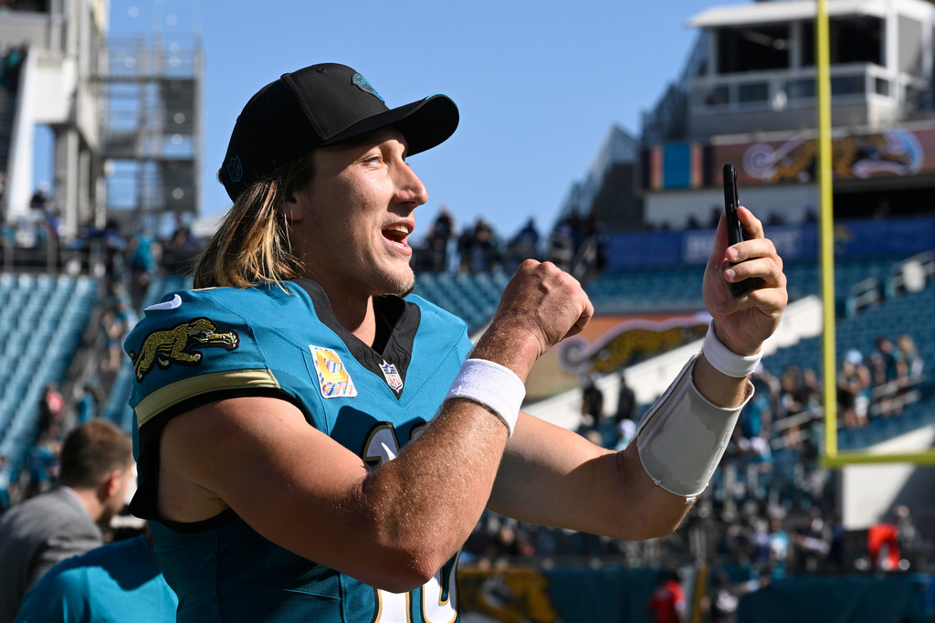 Jacksonville Jaguars quarterback Trevor Lawrence (16) reacts after an NFL football game against the New England Patriots in Jacksonville, Fla., Sunday, Sept. 27, 2026. (AP Photo/Phelan M. Ebenhack)