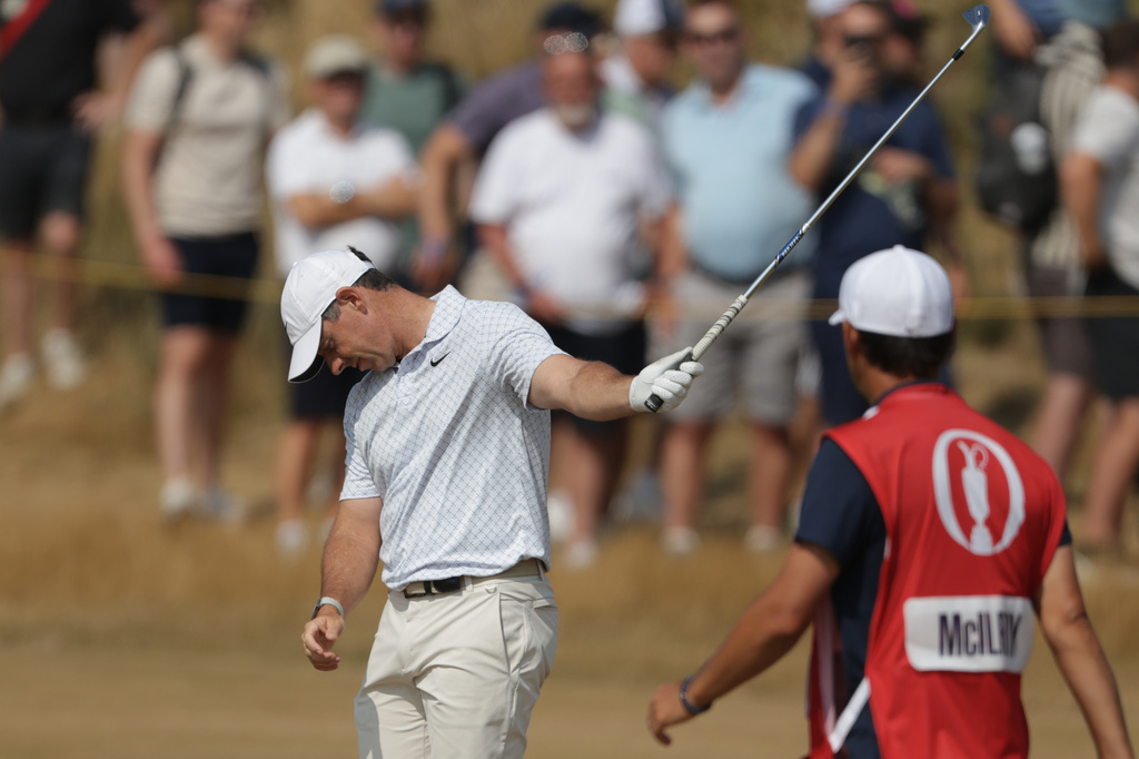 Rory McIlroy of Northern Ireland reacts after playing a shot to the 2nd green during the second day of the British Open Golf championships at Royal Birkdale golf club, in Southport, England, Friday, July 17, 2026. (AP Photo/Peter Morrison)
