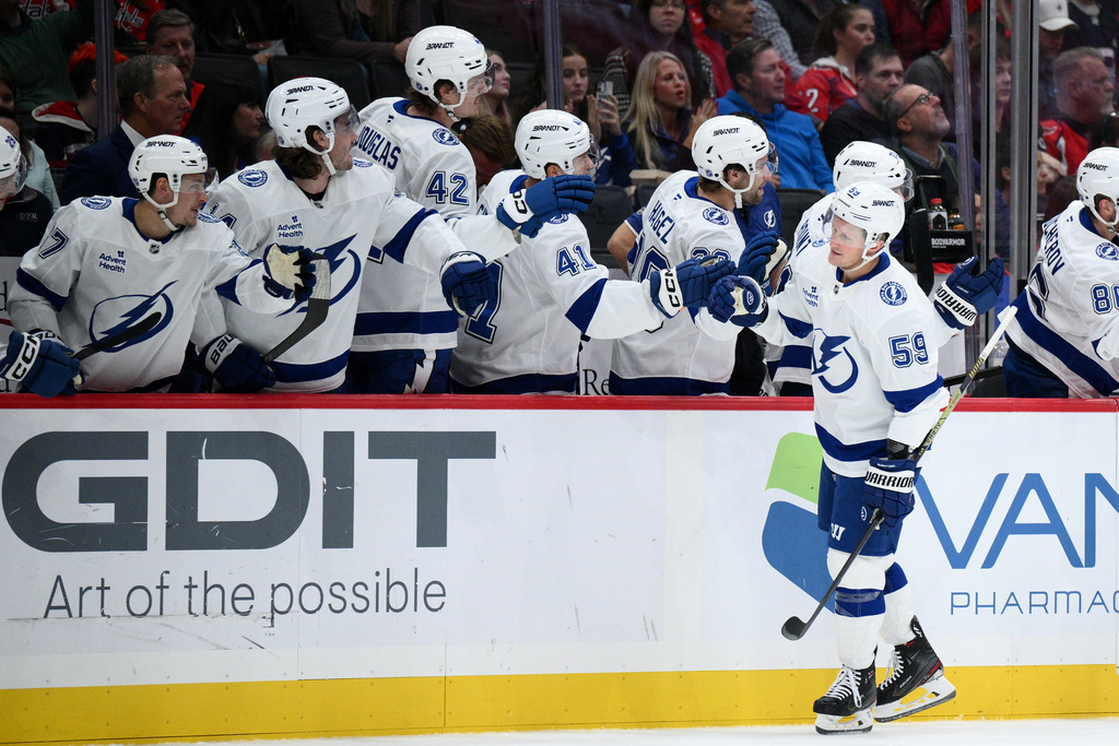Tampa Bay Lightning center Jake Guentzel (59) celebrates his goal during the first period of an NHL hockey game against the Washington Capitals, Tuesday, Oct. 14, 2025, in Washington. (AP Photo/Nick Wass)