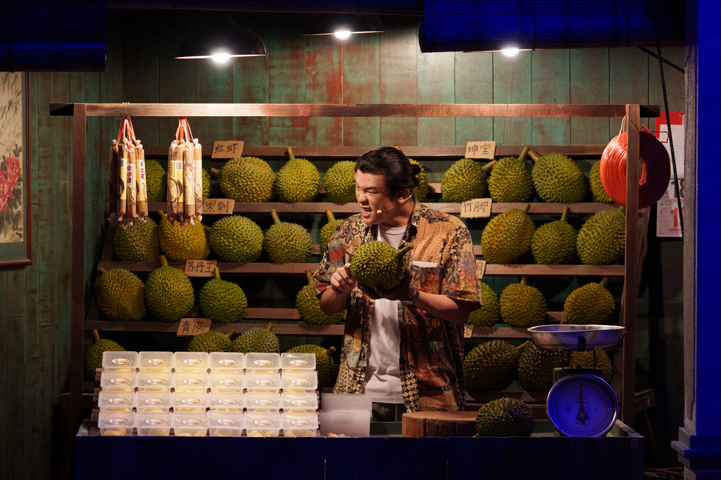 A presenter demonstrates how to open a durian during a guided session at KLDEX (Kuala Lumpur Durian Experience Centre) in Kuala Lumpur, Malaysia, Friday, June 26, 2026. (AP Photo/Vincent Thian)