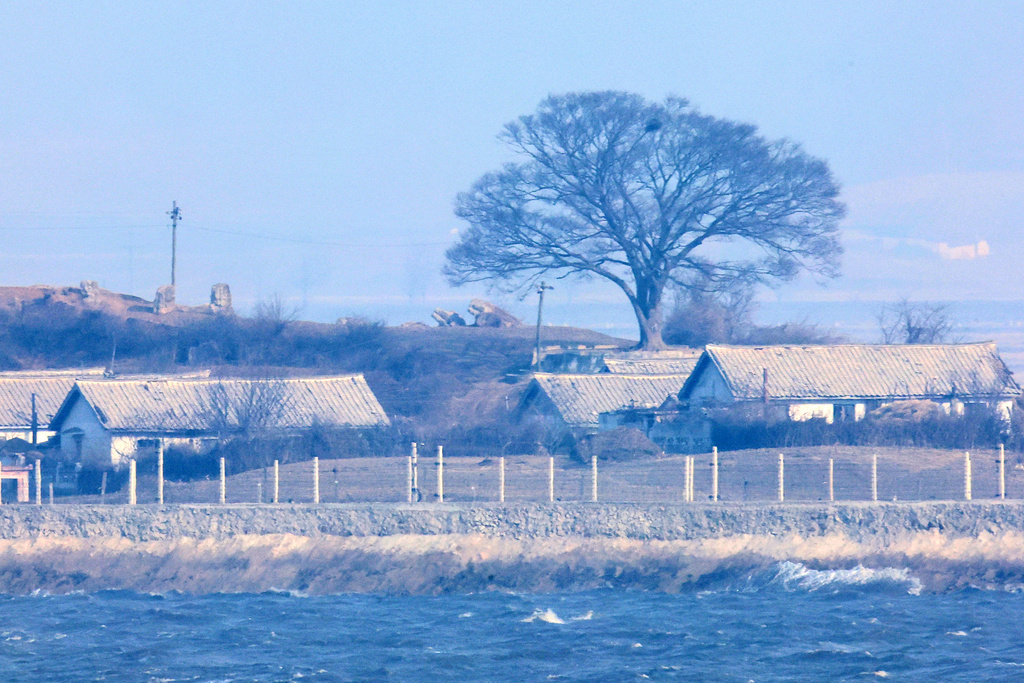 North Korea's Kaepoong village is seen from Ganghwa, South Korea, near the border with North Korea, Saturday, Jan. 10, 2026. (Im Sun-suk/Yonhap via AP)