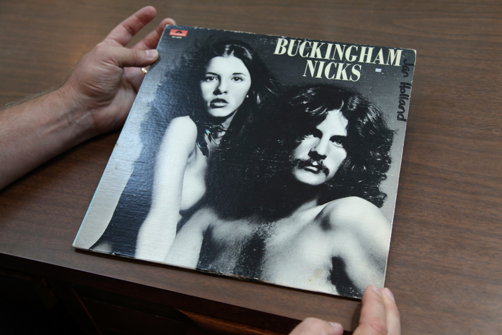 Music historian and journalist Brian Mansfield holds an original pressing of the &quot;Buckingham Nicks&quot; vinyl record at his home in Nashville, Tenn., Wednesday, July 23, 2025. (AP Photo/Kristin M. Hall)