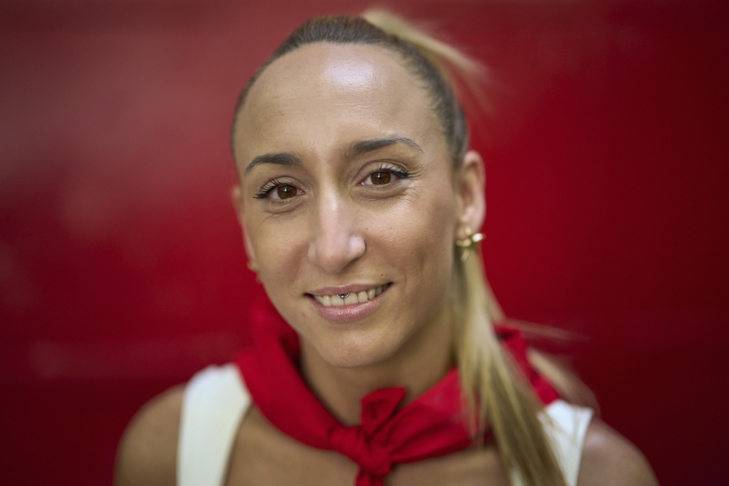 Bull-runner Paula Lopez poses for a portrait during the San Ferm&iacute;n festival in Pamplona, northern Spain, on Friday, July 11, 2025. (AP Photo/Miguel Oses)