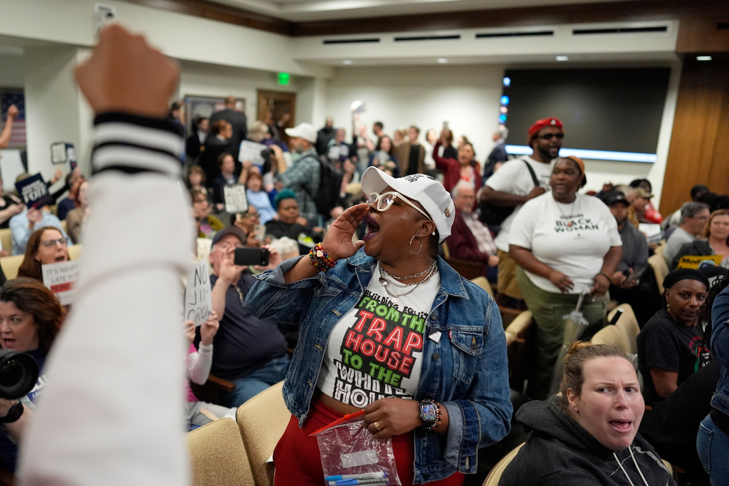 People protest in a Senate committee meeting during a special session of the state legislature to redraw U.S. Congressional voting maps Wednesday, May 6, 2026, in Nashville, Tenn. (AP Photo/George Walker IV)