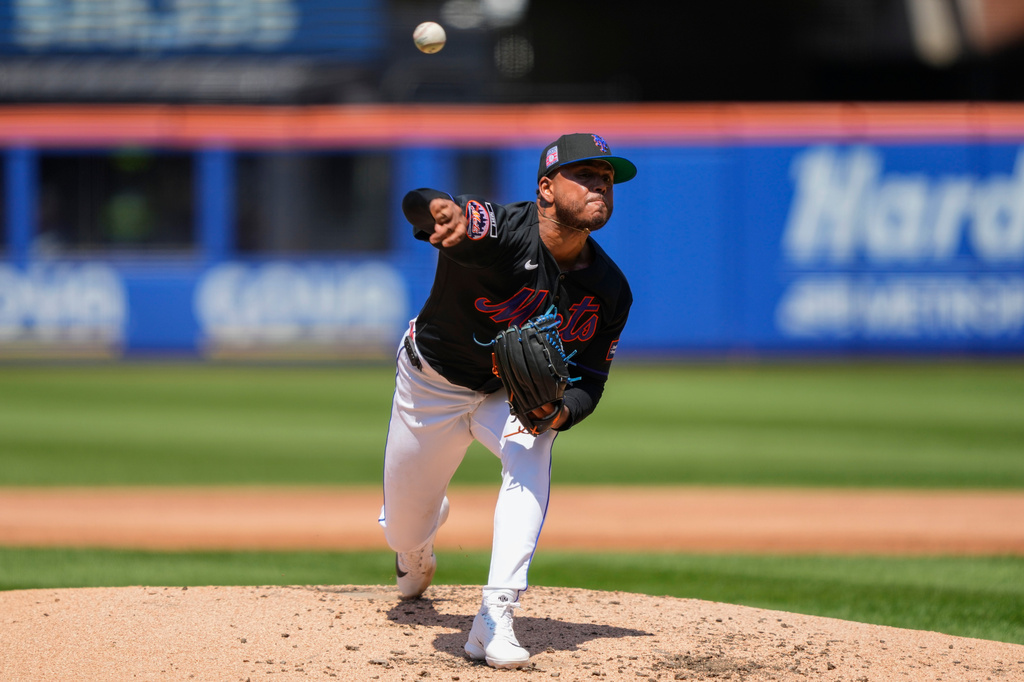 New York Mets pitcher Freddy Peralta throws during the second inning of a baseball game against the Los Angeles Dodgers, Sunday, July 26, 2026, in New York. (AP Photo/Yuki Iwamura)
