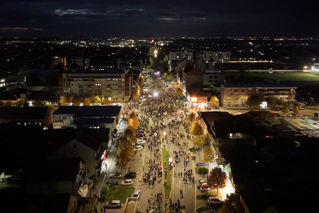 An aerial view of students and anti-government protesters marching to Novi Sad for a huge rally on Nov. 1, 2024 marking the first anniversary of a train station disaster that killed 16 people, in Nova Pazova, Serbia, Thursday, Oct. 30, 2025. (AP Photo/Armin Durgut)