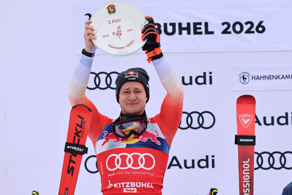 Switzerland's Marco Odermatt celebrates his second place in a men's alpine ski World Cup downhill, in Kitzbuehel, Austria, Saturday, Jan. 24, 2026. (AP Photo/Marco Trovati)