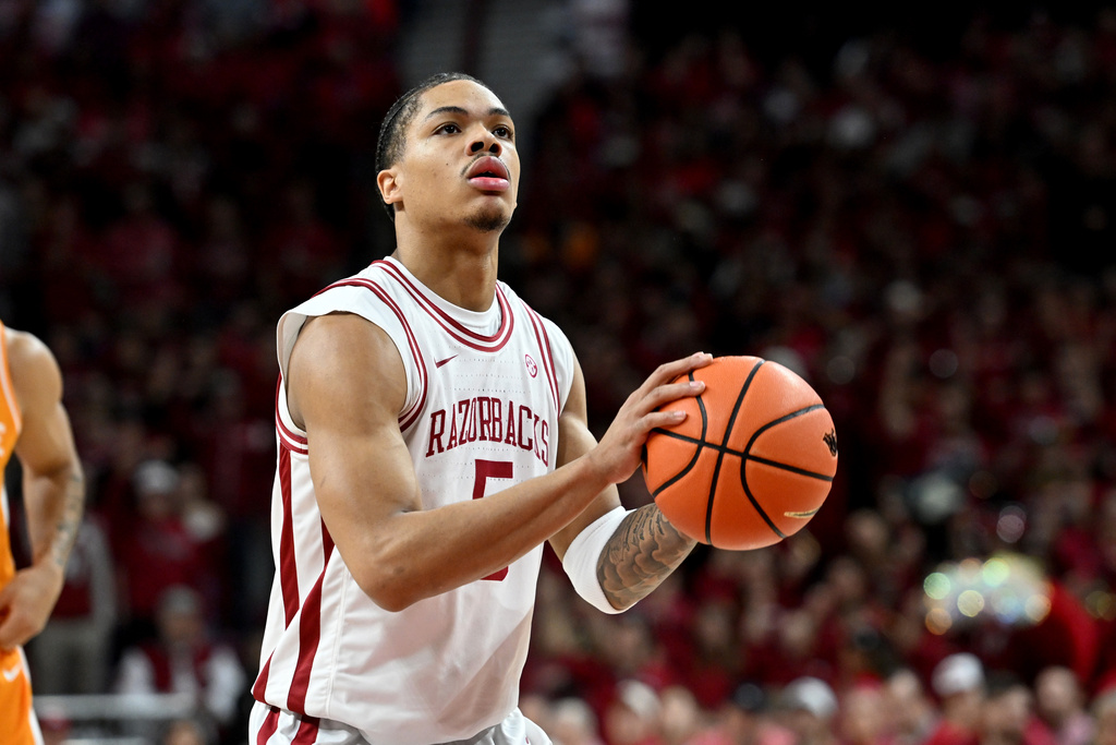 Arkansas guard Darius Acuff Jr. (5) shoots a free throw against Tennessee during the first half of an NCAA college basketball game Saturday, Jan. 3, 2026, in Fayetteville, Ark. (AP Photo/Michael Woods)