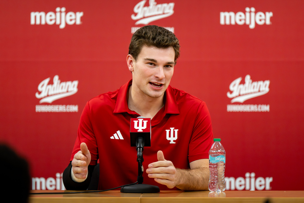 Indiana quarterback Fernando Mendoza speaks during a press conference, Tuesday, Dec. 9, 2025, in Bloomington, Ind. (AP Photo/Doug McSchooler)