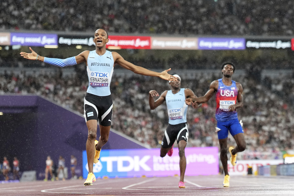 Botswana's Busang Collen Kebinatshipi celebrates taking the gold medal in the men's 400 meters final at the World Athletics Championships in Tokyo, Thursday, Sept. 18, 2025. (AP Photo/Petr David Josek)