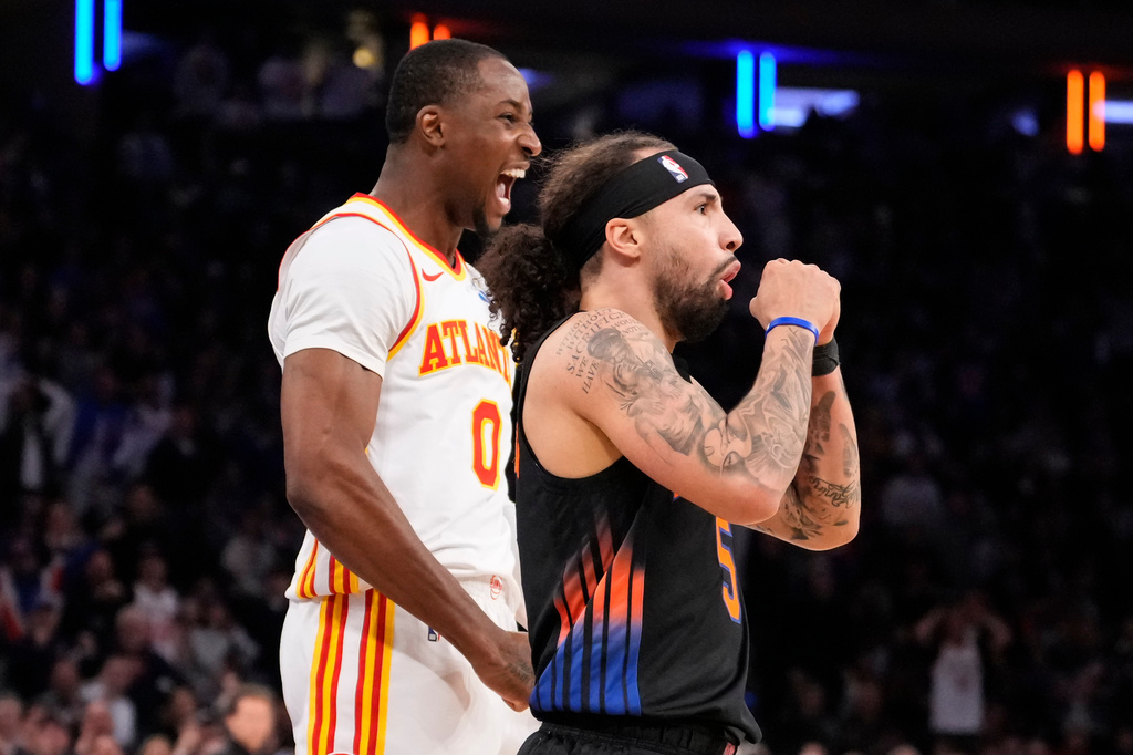 New York Knicks guard Jose Alvarado (5) reacts after fouling Atlanta Hawks forward Jonathan Kuminga (0) during the second half in Game 2 of a first-round NBA playoffs basketball series, Monday, April 20, 2026, in New York. (AP Photo/Yuki Iwamura)
