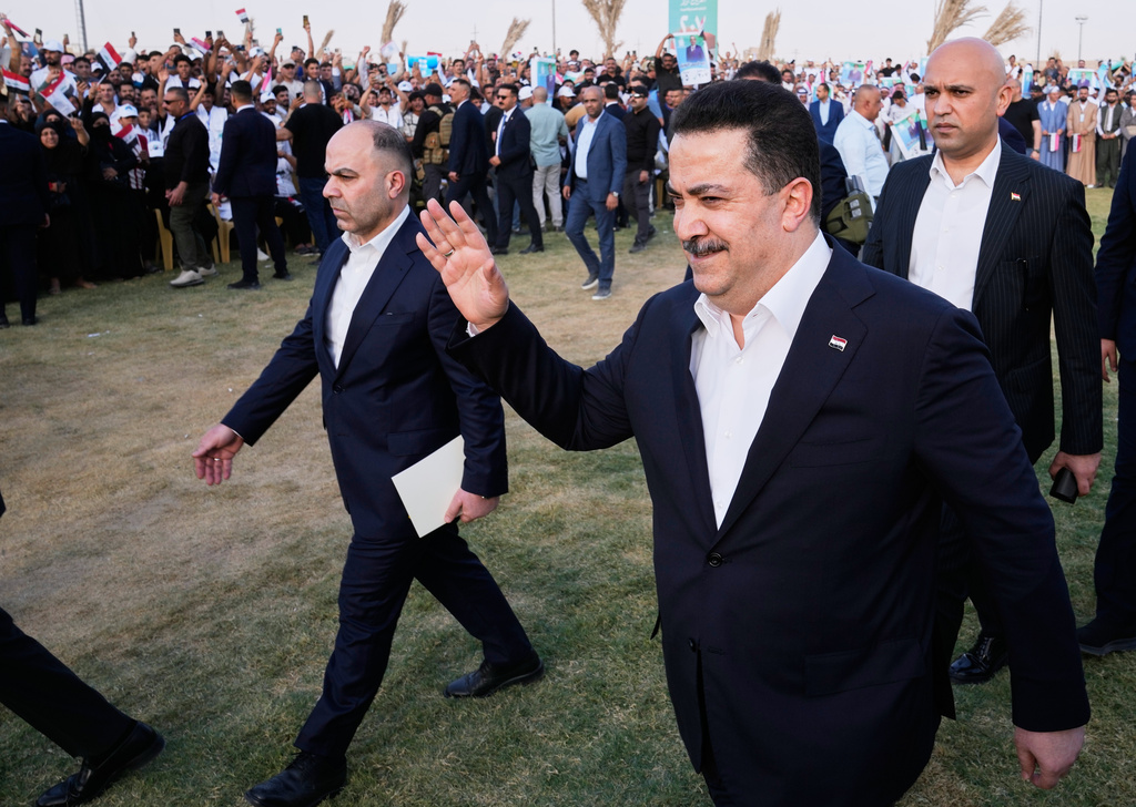 Iraqi Prime Minister Mohammed Shia al-Sudani arrives to his political block campaign rally before the parliamentary elections in Mosul, Iraq, Saturday, Oct. 18, 2025. (AP Photo/Hadi Mizban)