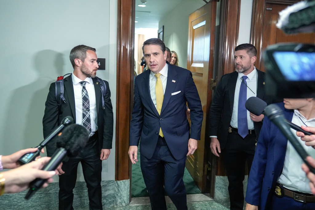Acting Attorney General Todd Blanche walks to speak with reporters after attending a meeting related to survivors of convicted sex offender Jeffrey Epstein, in Washington, Thursday, July 16, 2026. (AP Photo/Mariam Zuhaib)