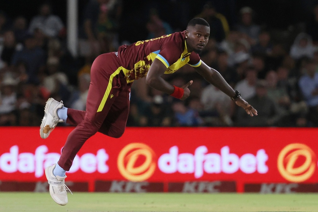 West Indies bowler Jayden Seales follows through his delivery during the T20 International cricket match between South Africa and West Indies, in Paarl, South Africa, Tuesday, Jan. 27, 2026. (AP Photo/Halden Krog)