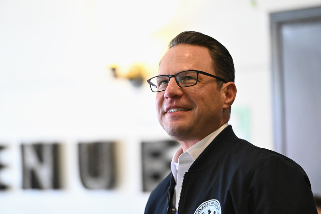 FILE - Pennsylvania Gov. Josh Shapiro smiles as he's introduced to the crowd at a Clinton County Democratic Party event at the Avenue 209 coffee shop, April 11, 2026, in Lock Haven, Pa. (AP Photo/Marc Levy, File)