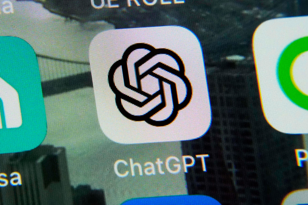 FILE - The ChatGPT app is displayed on an iPhone in New York, May 18, 2023. (AP Photo/Richard Drew, File)