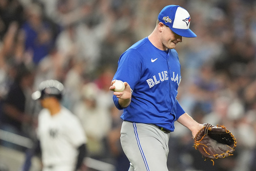 Toronto Blue Jays pitcher Louis Varland reacts after giving up a three-run home run to New York Yankees' Aaron Judge during the fourth inning of Game 3 of baseball's American League Division Series, Tuesday, Oct. 7, 2025, in New York. (AP Photo/Frank Franklin II) Toronto Blue Jays pitcher Louis Varland reacts after giving up a three-run home run to New York Yankees' Aaron Judge during the fourth inning of Game 3 of baseball's American League Division Series, Tuesday, Oct. 7, 2025, in New York. (AP Photo/Frank Franklin II)