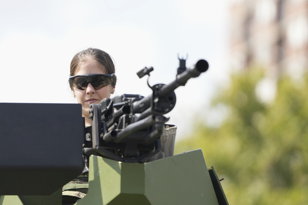 A Serbian Army soldier prepares ahead of a military parade scheduled for Sept. 20 in the Serbian capital Belgrade, Friday, Sept. 12, 2025. (AP Photo/Darko Vojinovic)