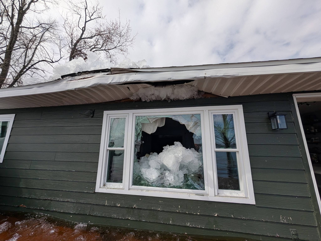 This image provided by Christopher Narsesian shows chunks of ice inside a home in Michigan’s Black Lake in the northeastern Lower Peninsula on April 19, 2026. (Christopher Narsesian via AP)