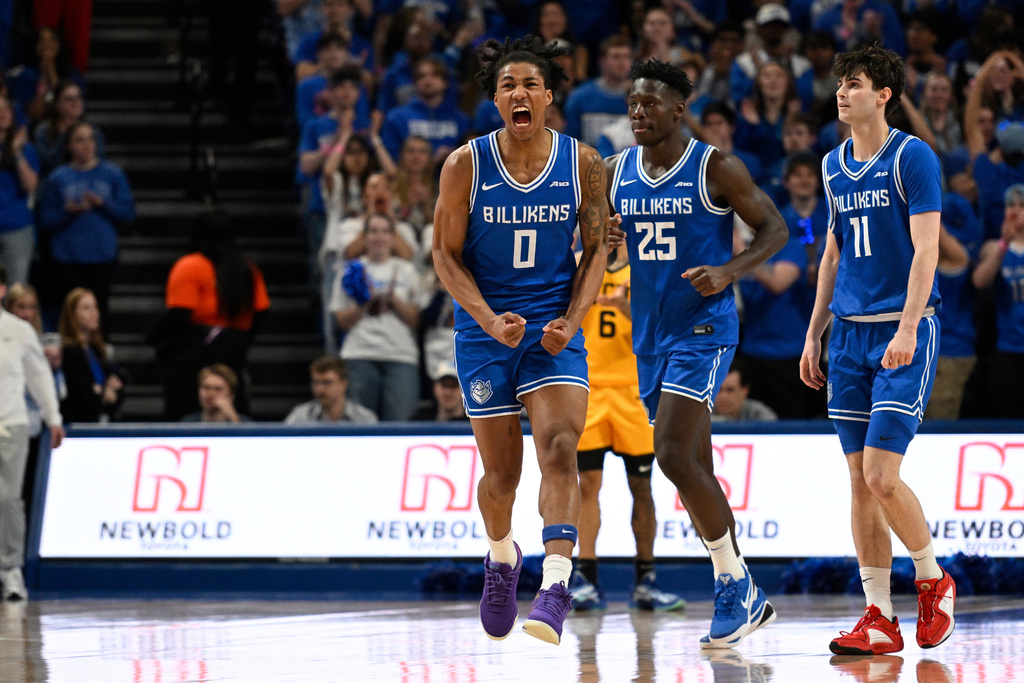Saint Louis' Kellen Thames (0) reacts after scoring during the first half of an NCAA college basketball game against Virginia Commonwealth, Friday, Feb. 20, 2026, in St. Louis. (AP Photo/Lexie Knight)