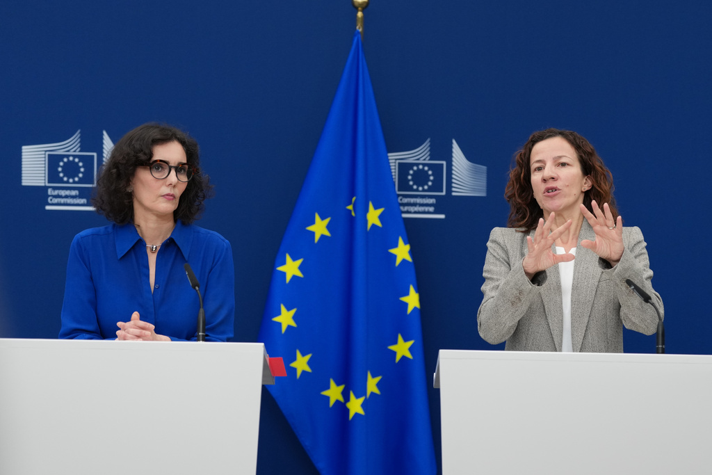 European Commissioner for People, Skills and Preparedness Roxana Minzatu, right, and European Commissioner for Preparedness and Crisis Hadja Lahbib address the media on the Commission's response to the European Citizens' Initiative 'My Voice, My Choice' at EU headquarters in Brussels, Thursday, Feb. 26, 2026. (AP Photo/Virginia Mayo)