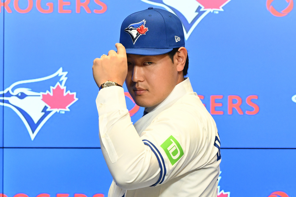 Toronto Blue Jays' Kazuma Okamoto poses during an introductory press conference at Rogers Centre in Toronto, Canada, on Tuesday, Jan. 6, 2026. (Jon Blacker/The Canadian Press via AP)