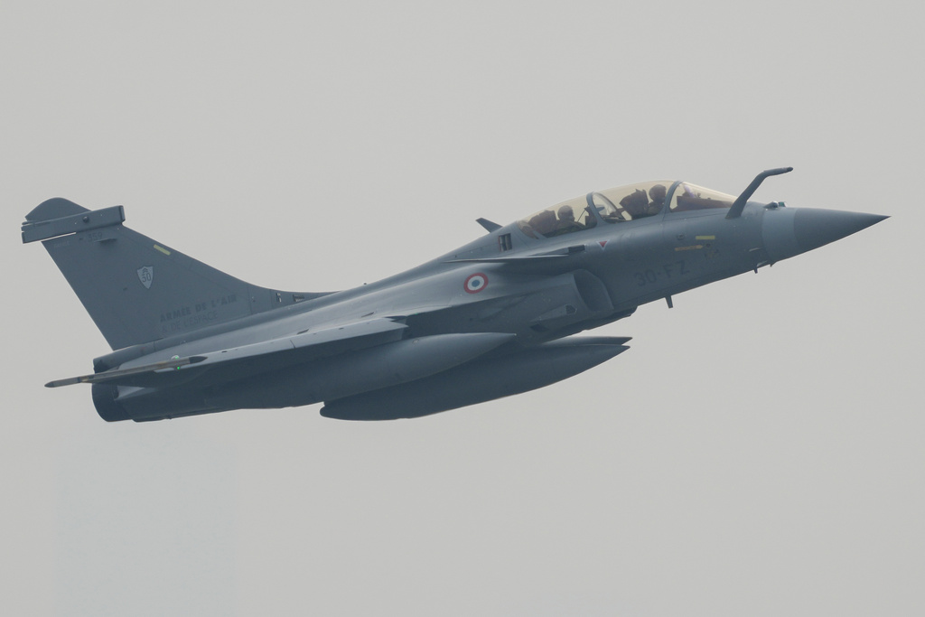 FILE - France's Rafale B twin-seat multirole fighter performs during the Pegase 2024 mission at Halim Perdanakusuma airport in Jakarta, Indonesia, Wednesday, July 24, 2024. (AP Photo/Tatan Syuflana, File)