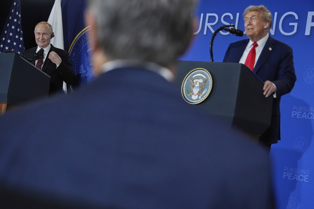 President Donald Trump and Russia's President Vladimir Putin speak during a news conference at Joint Base Elmendorf-Richardson, Alaska, Friday, Aug. 15, 2025. (AP Photo/Julia Demaree Nikhinson)