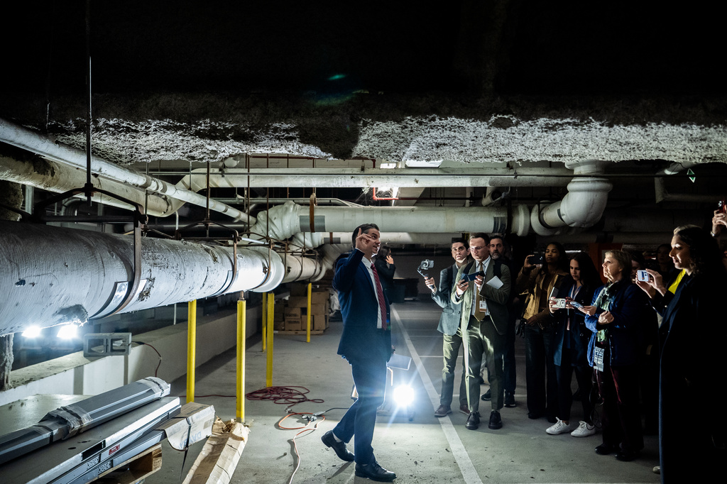 Matt Floca, the John F. Kennedy Center for the Performing Arts' new executive director and chief operating officer, shows damage in the parking garage during a media tour, Wednesday, April 22, 2026, in Washington. (AP Photo/Julia Demaree Nikhinson)