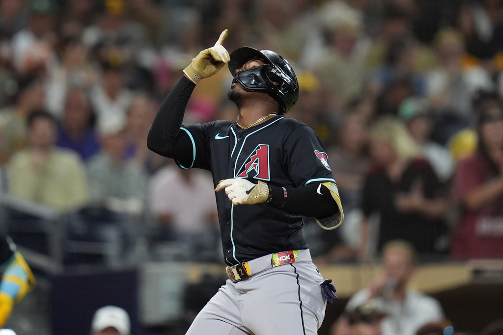 Arizona Diamondbacks' Geraldo Perdomo celebrates after hitting a home run during the fifth inning of a baseball game against the San Diego Padres Saturday, Sept. 27, 2025, in San Diego. (AP Photo/Gregory Bull)