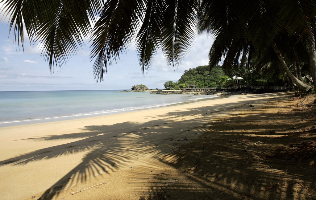 FILE - The empty beach of the Bombom resort on Principe Island, Nov. 8 2006. (AP Photo/Armando Franca, File)