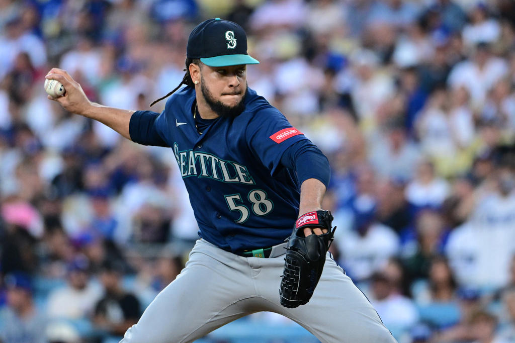 Seattle Mariners starting pitcher Luis Castillo (58) throws a pitch against the Los Angeles Dodgers during the first inning of a baseball game Tuesday, July 28 2026, in Los Angeles. (AP Photo/Wally Skalij)