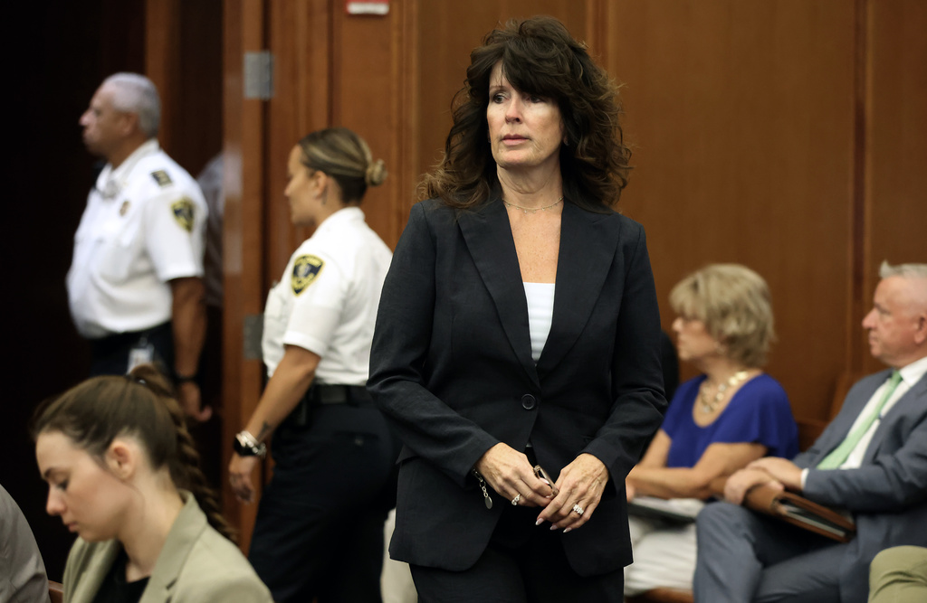 Elaine Rossi, the nanny to Clancy children, enters the courtroom to be a witness during Lindsay Clancy's murder trial at Plymouth Superior Court in Plymouth, Mass., Wednesday, Aug. 5, 2026. (David L Ryan/The Boston Globe via AP, Pool)