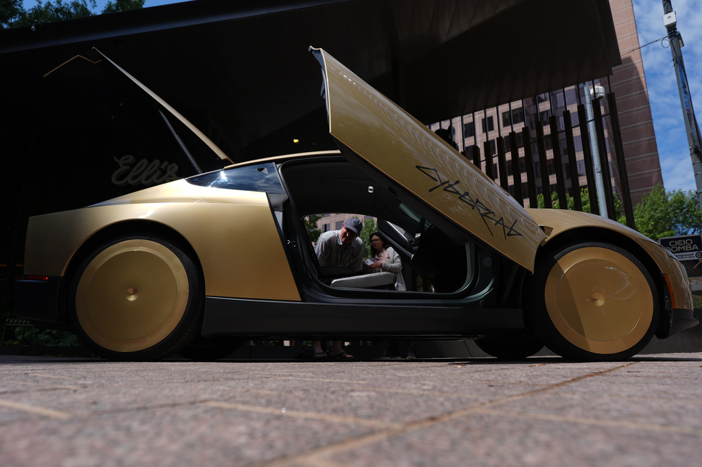 A Tesla Cybercab is displayed in downtown Austin, Texas, Thursday, Sept. 3, 2026. (AP Photo/Eric Gay)