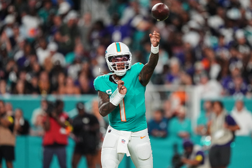 Miami Dolphins quarterback Tua Tagovailoa (1) throws against the Baltimore Ravens during the first half of an NFL football game, Thursday, Oct. 30, 2025, in Miami Gardens, Fla. (AP Photo/Rebecca Blackwell) Miami Dolphins quarterback Tua Tagovailoa (1) throws against the Baltimore Ravens during the first half of an NFL football game, Thursday, Oct. 30, 2025, in Miami Gardens, Fla. (AP Photo/Rebecca Blackwell)