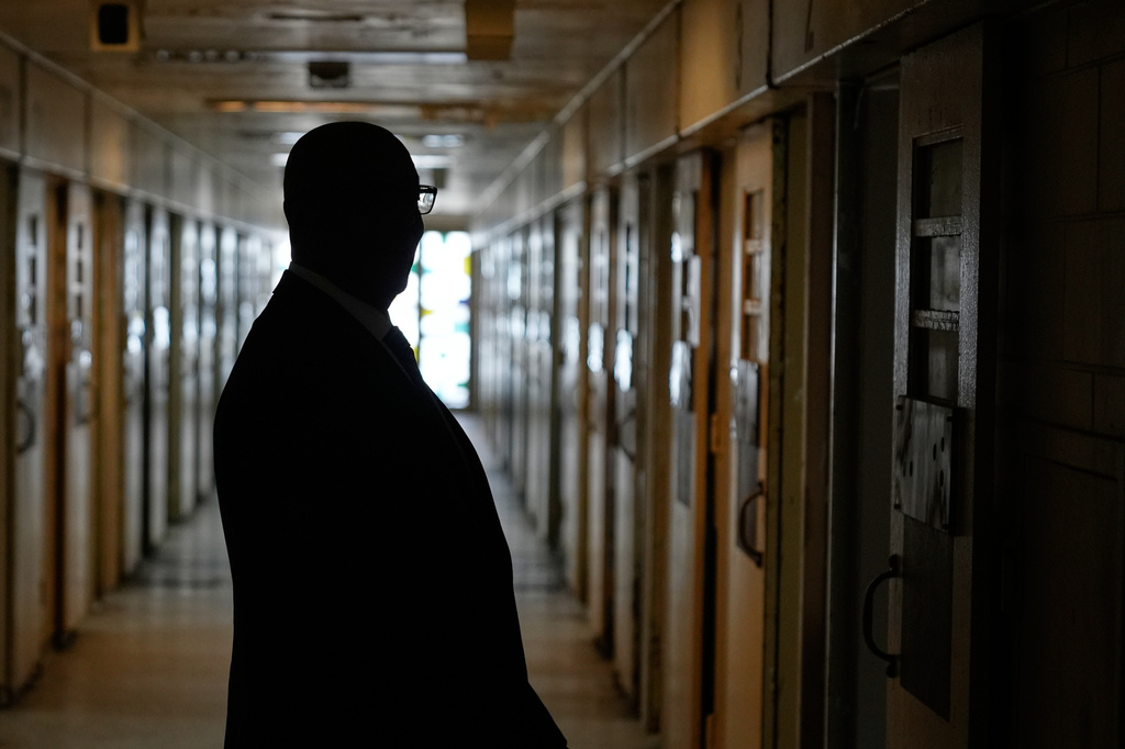 Stanley Richards, NYC Department of Correction commissioner, looks at the housing unit, currently unoccupied, where he was previously incarcerated on Rikers Island in New York, Tuesday, April 14, 2026. (AP Photo/Seth Wenig)