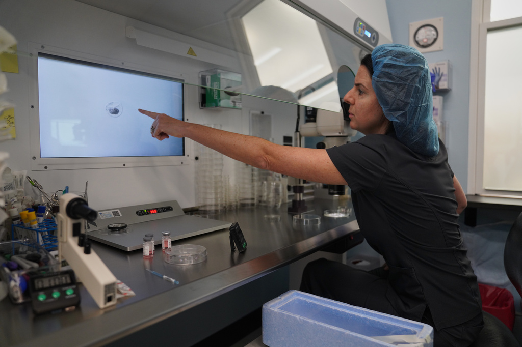 Sarah Atkinson, senior embryologist and lab supervisor, shows an embryo while preparing for a transfer at Rejoice Fertility, Jan. 11, 2026, in Knoxville, Tenn. (AP Photo/Jessie Wardarski)
